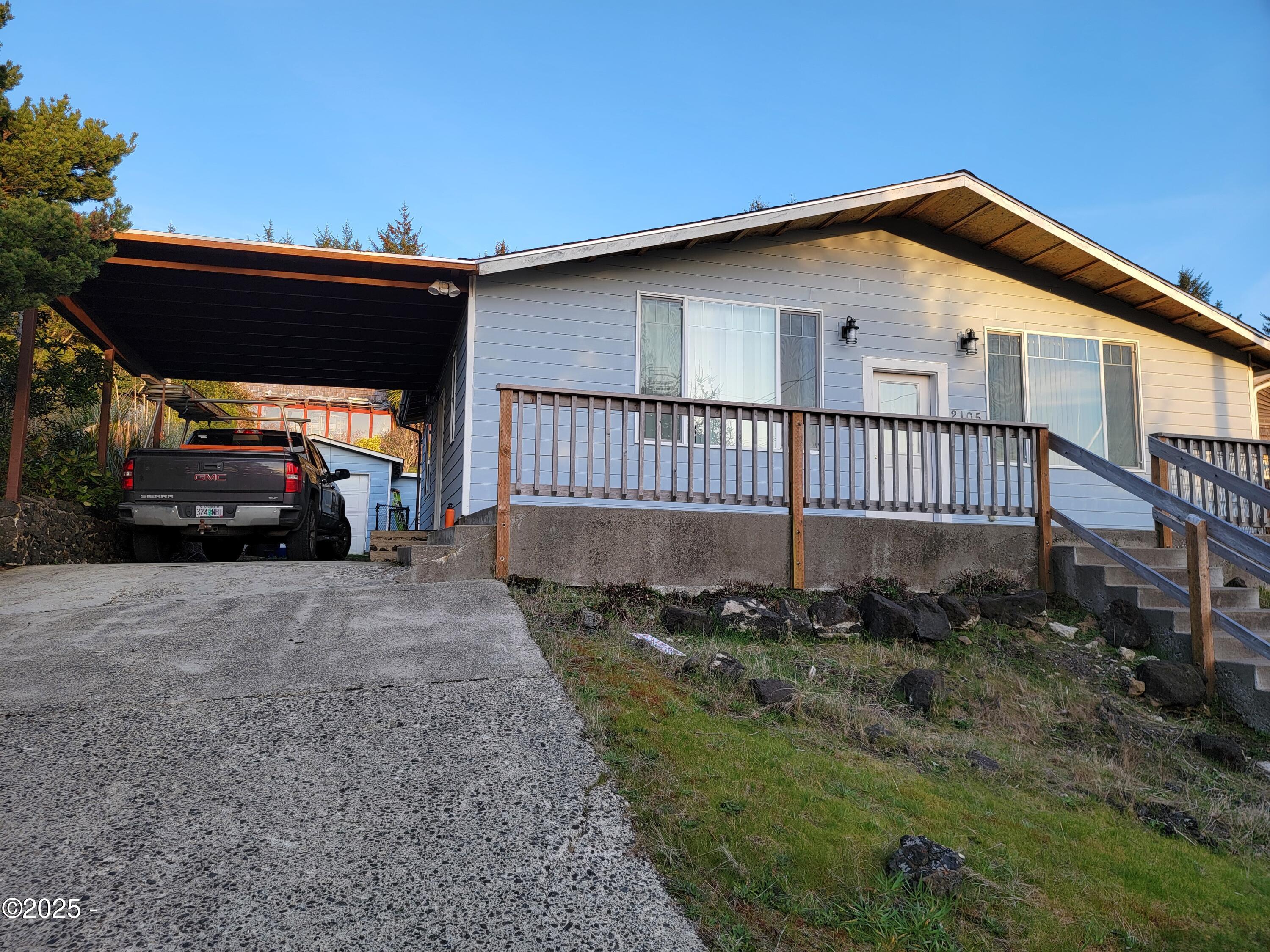 2105 Northwest View Ridge Drive Waldport, OR 97394 - Photo 2 of 12 ba front of house