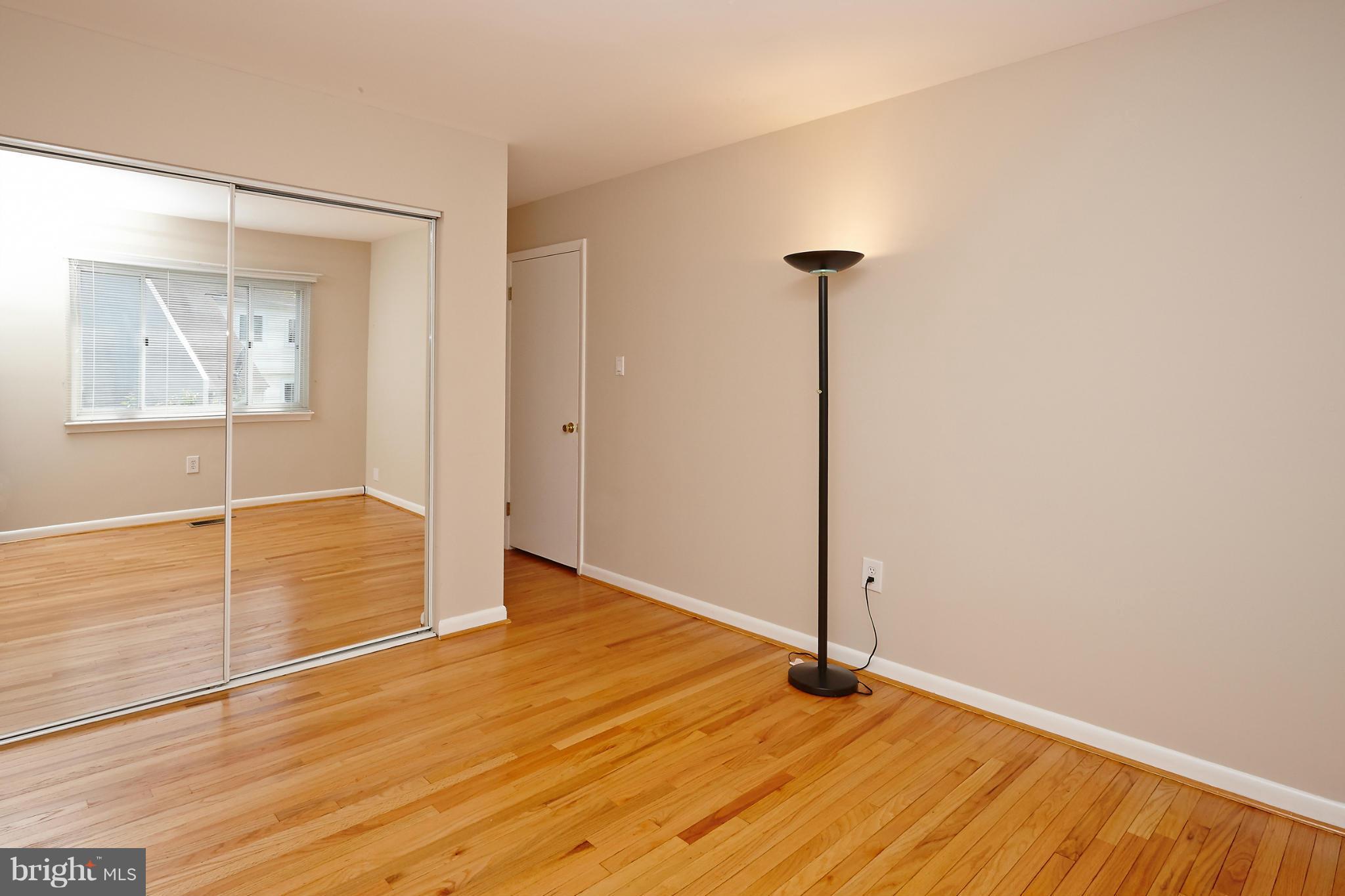 1426 Yellowwood Court Reston, VA 20190 - Photo 15 of 30 a view of empty room with wooden floor
