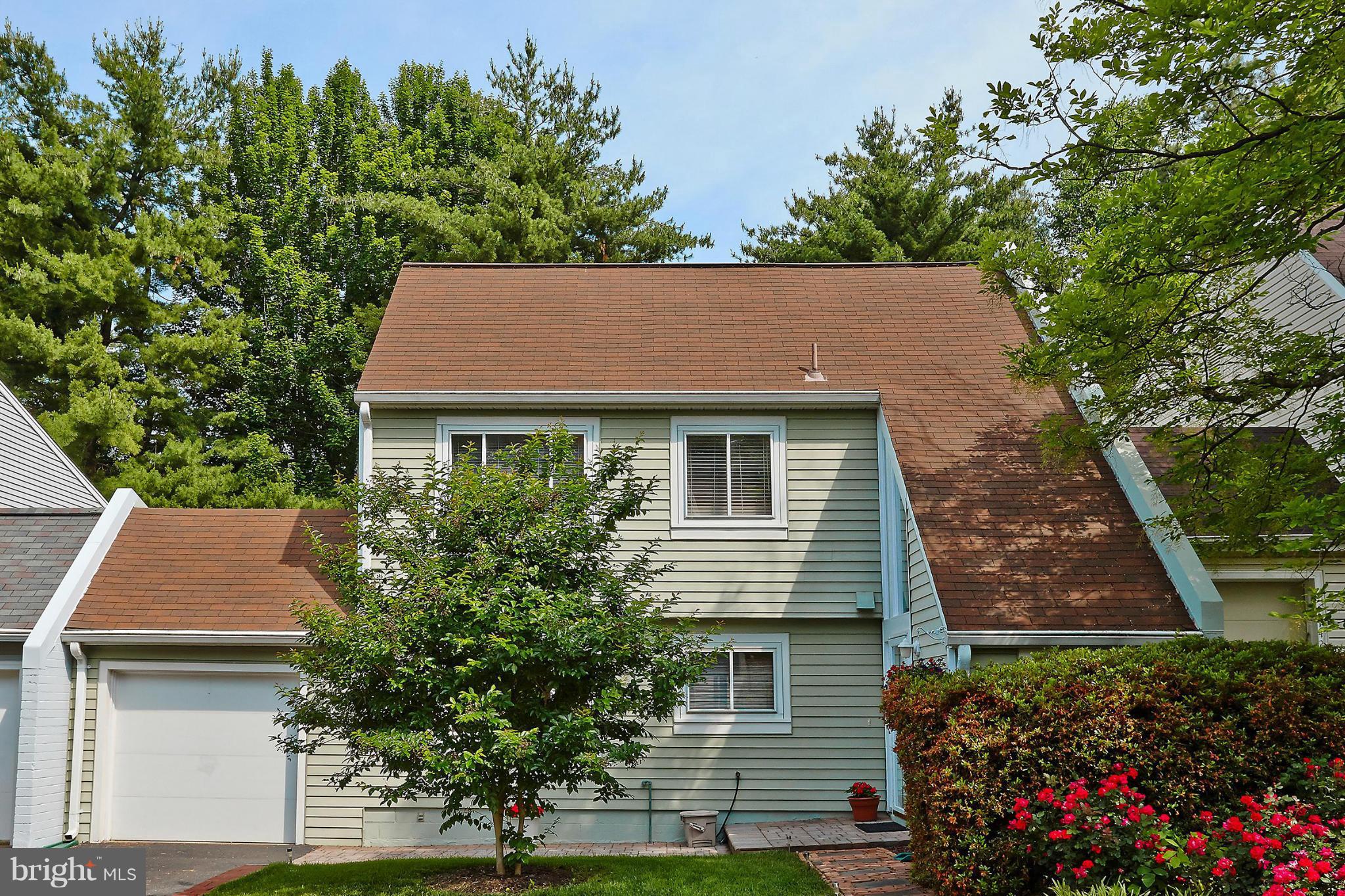 1426 Yellowwood Court Reston, VA 20190 - Photo 2 of 30 a aerial view of a house with a yard and potted plants