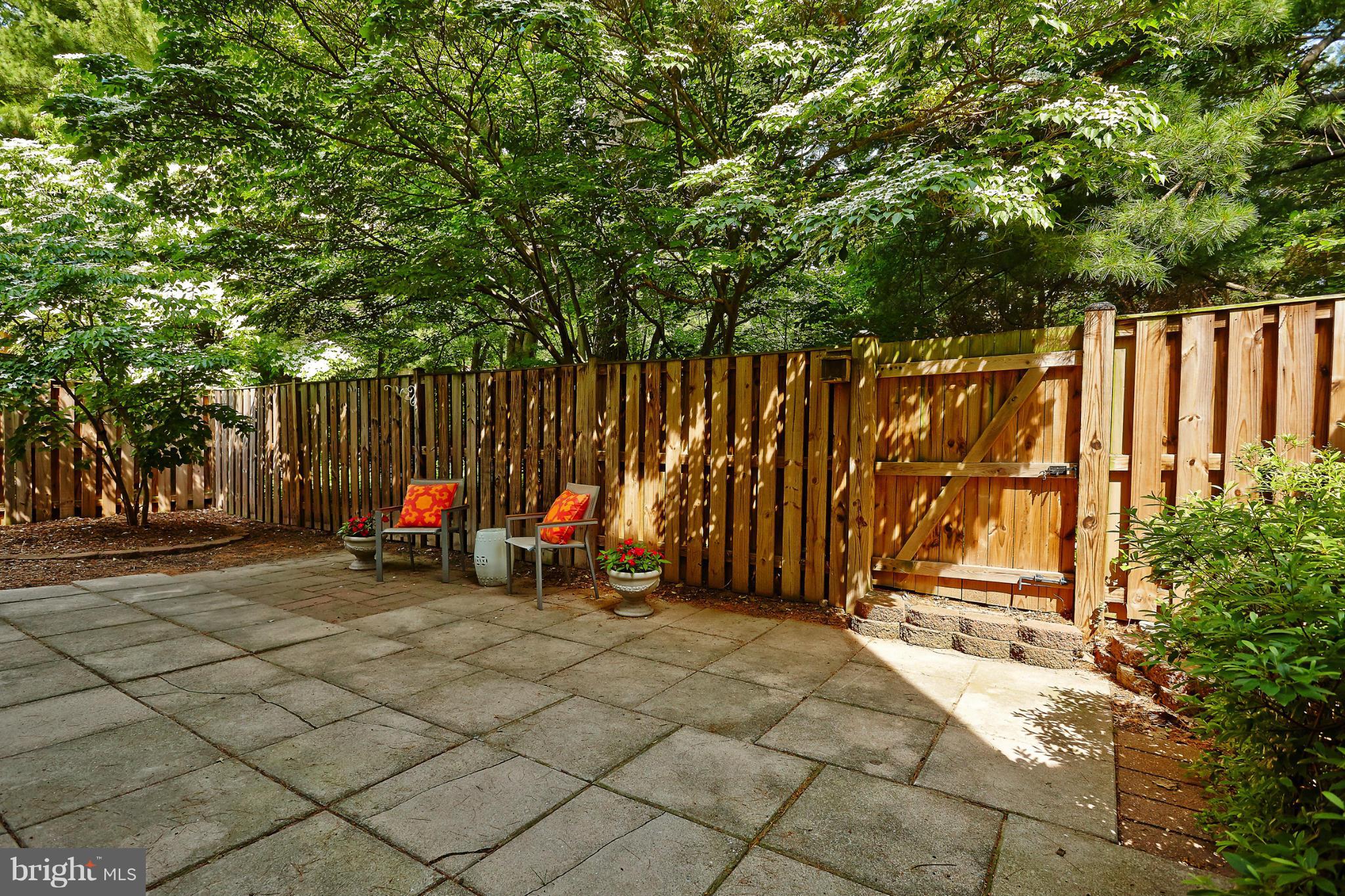 1426 Yellowwood Court Reston, VA 20190 - Photo 26 of 30 a view of outdoor space with garden and deck