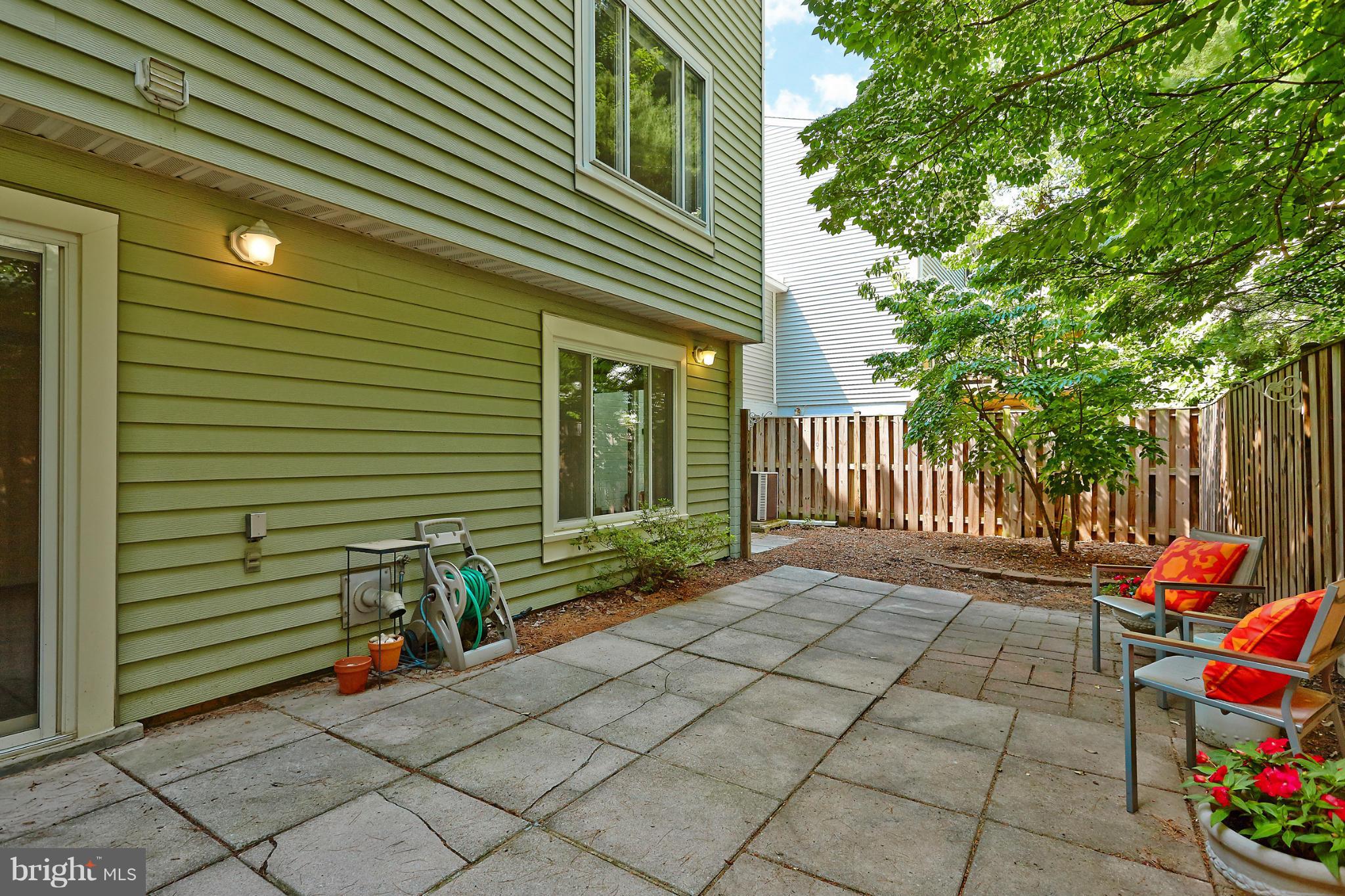1426 Yellowwood Court Reston, VA 20190 - Photo 27 of 30 a backyard of a house with seating space