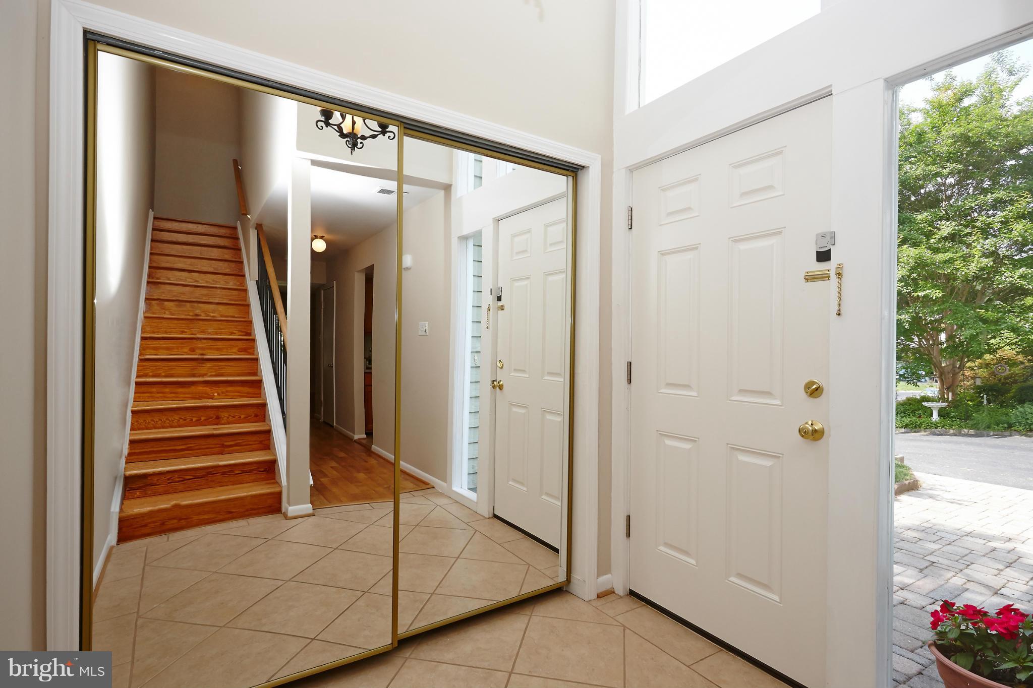 1426 Yellowwood Court Reston, VA 20190 - Photo 4 of 30 a view of an entryway with staircase