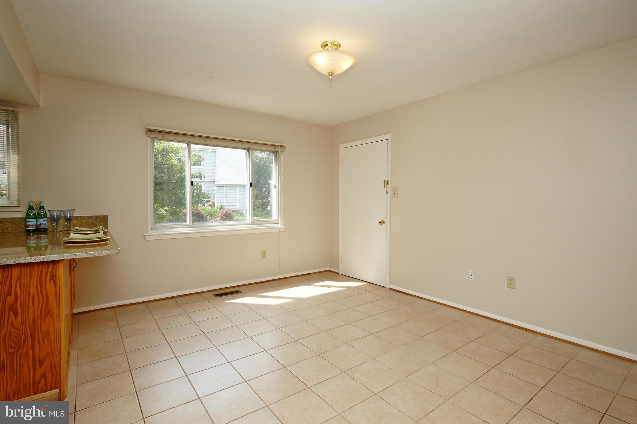 1426 Yellowwood Court Reston, VA 20190 - Photo 8 of 30 an empty room with windows