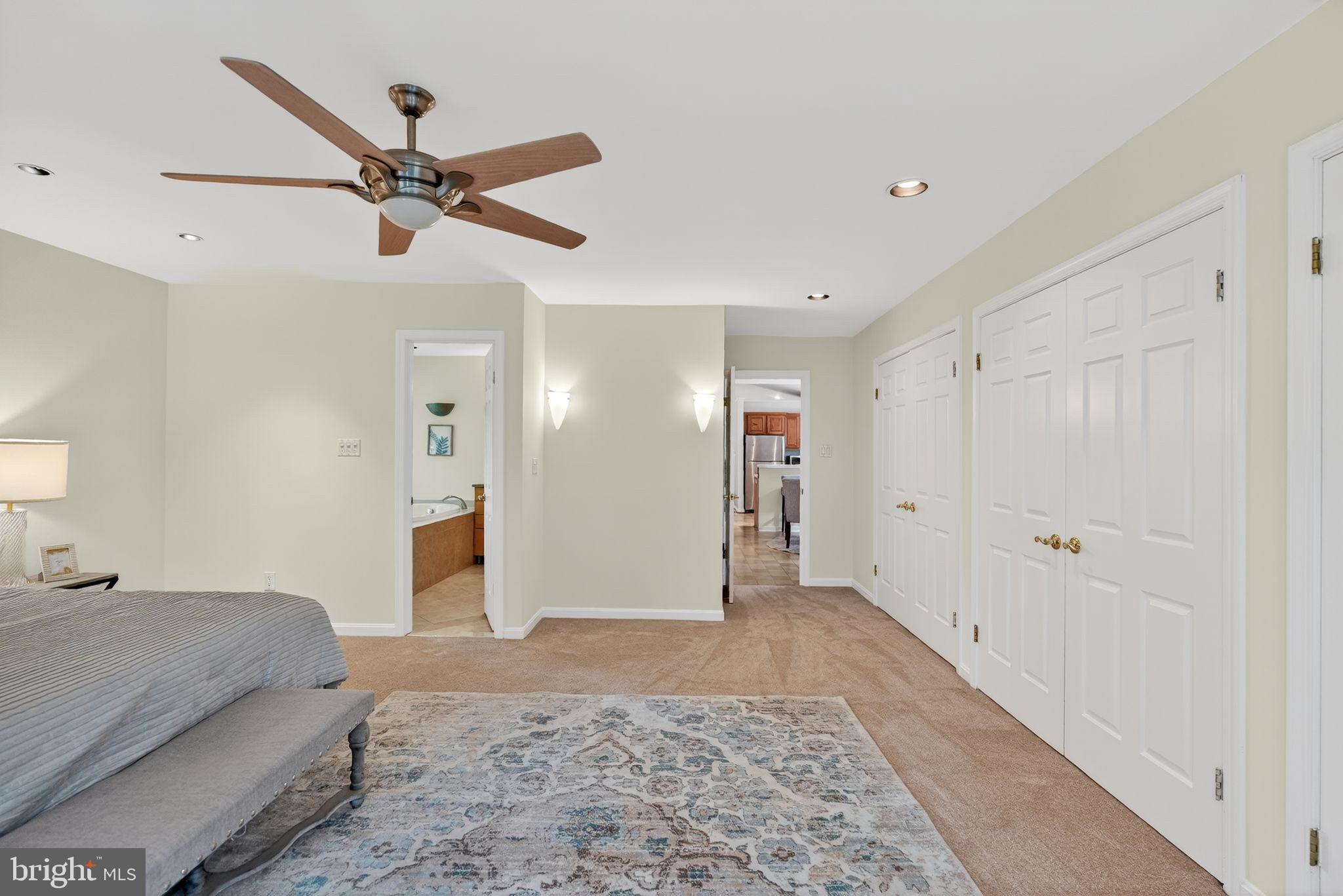 13821 Esworthy Road Darnestown, MD 20874 - Photo 12 of 98 Primary bedroom with wall of closets