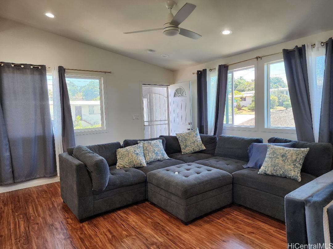 1638 Makamua Street Pearl City, HI 96782 - Photo 2 of 7 a living room with furniture and a window