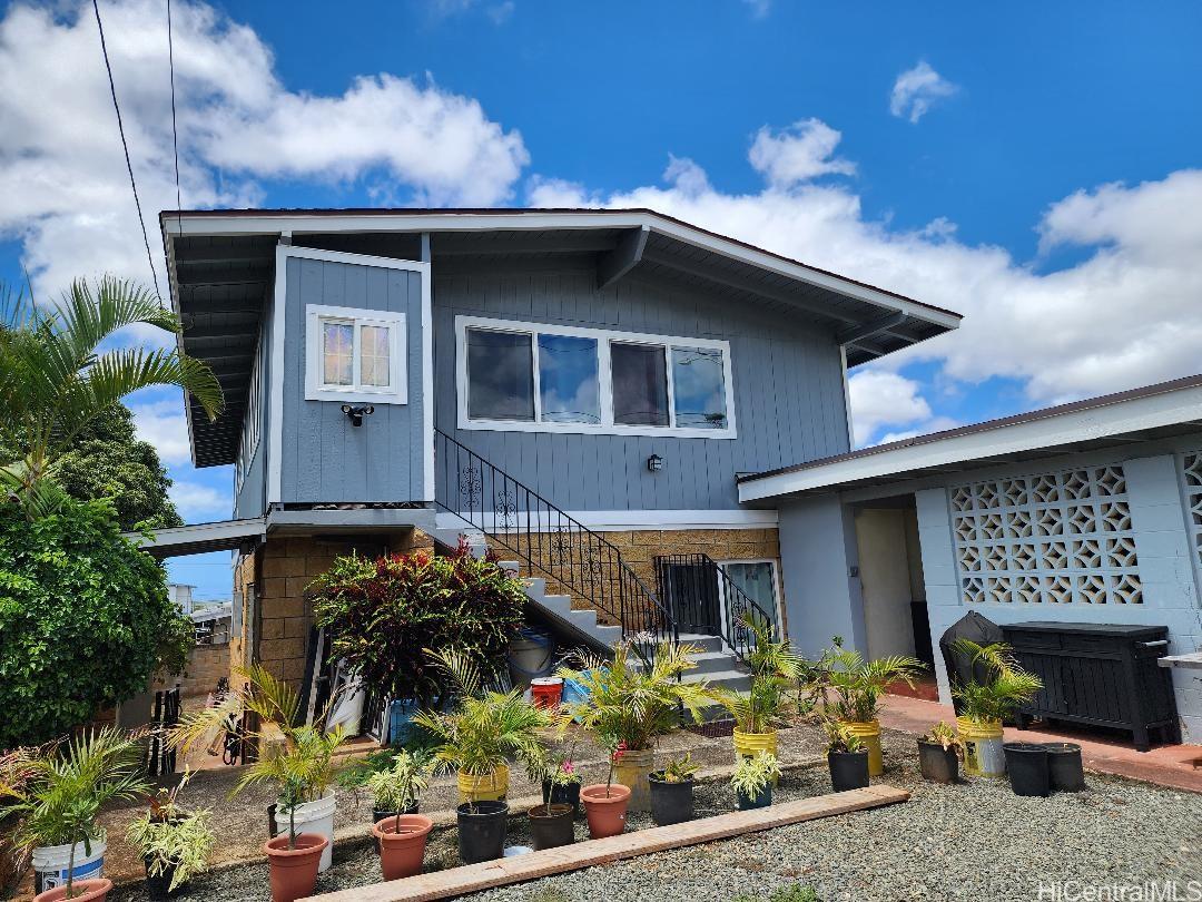 1638 Makamua Street Pearl City, HI 96782 - Photo 6 of 7 a front view of a house with a yard