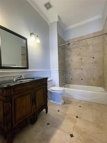 a kitchen with stainless steel appliances a refrigerator and cabinets