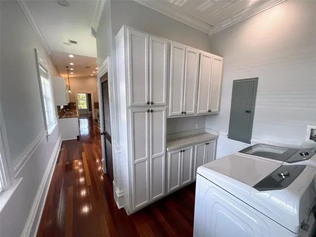 a kitchen with a stove a sink and a refrigerator
