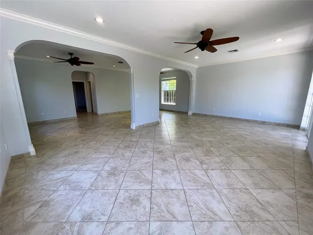 a view of an empty room and window