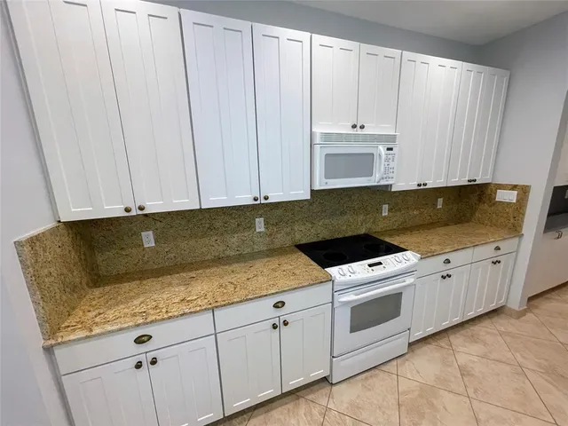 a view of a balcony with lake view and mountain view