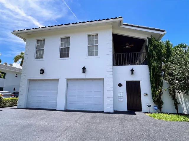 a view of gallery with wooden floor