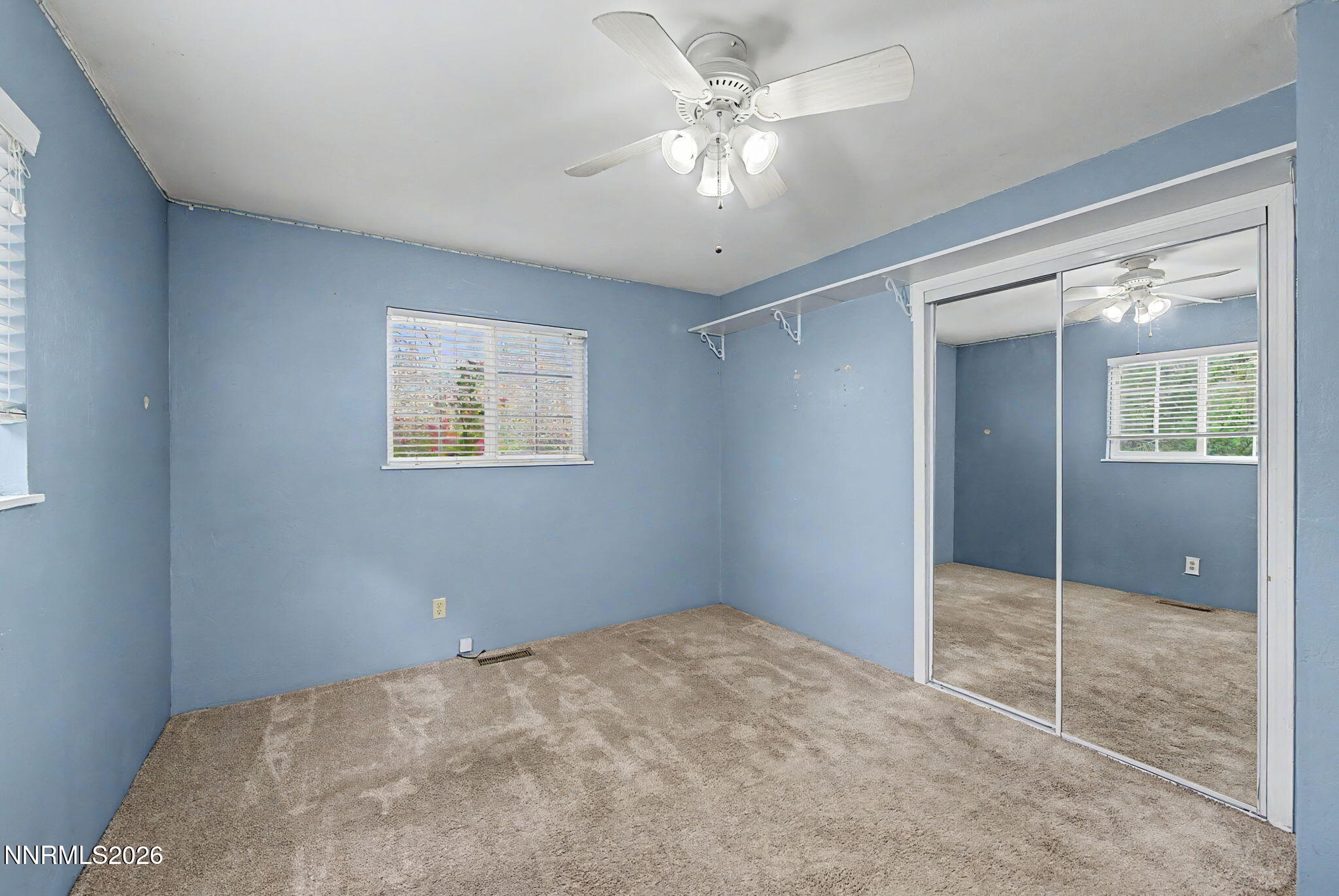 11577 Deodar Way Reno, NV 89506 - Photo 27 of 58 a view of an empty room with window