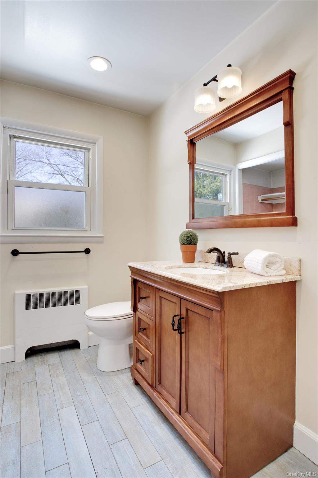 27 Avalon Road Garden City, NY 11530 - Photo 19 of 31 1st floor Powder Room with laundry