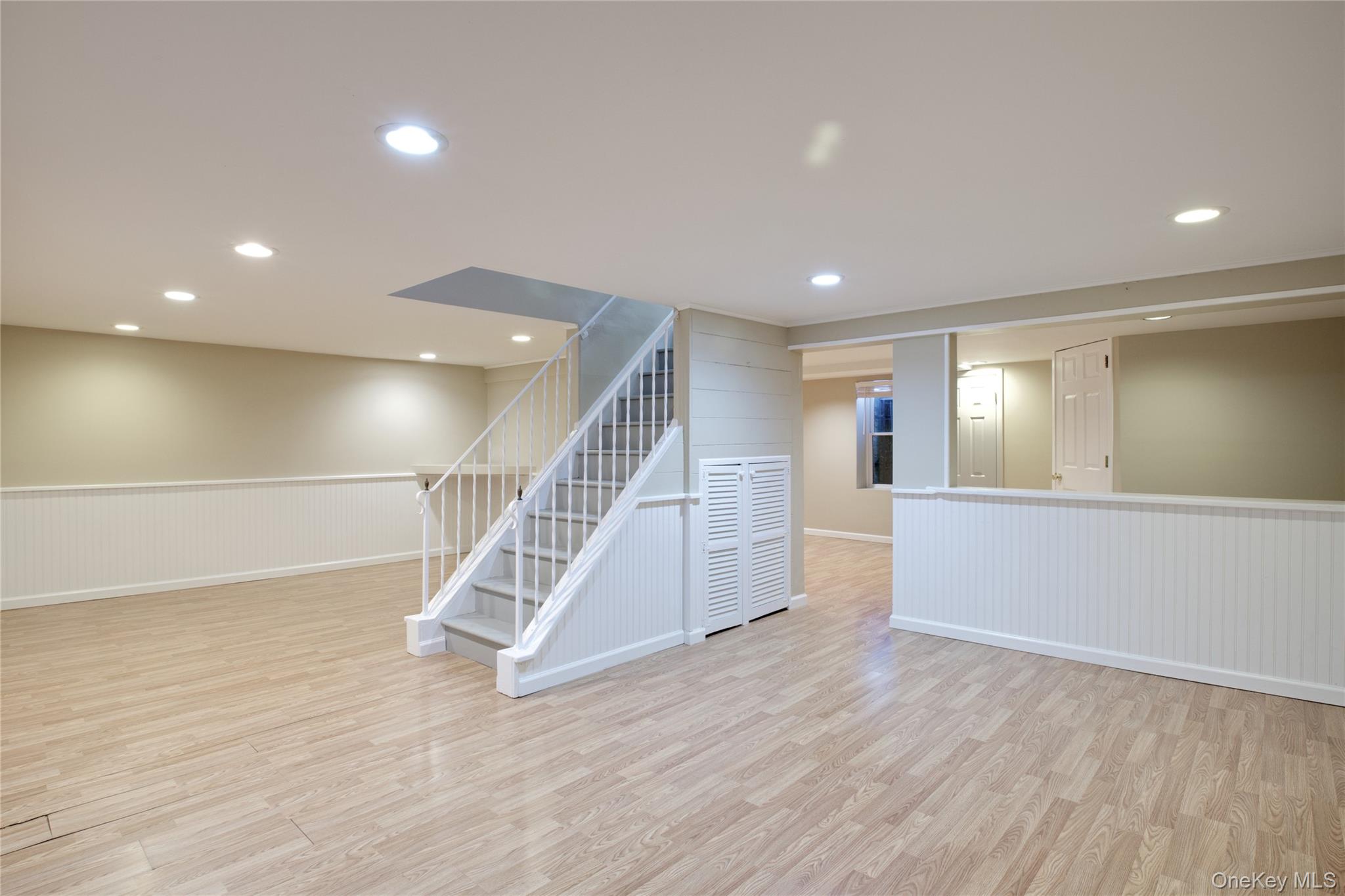 27 Avalon Road Garden City, NY 11530 - Photo 23 of 31 Large basement with multiple recreational rooms plus storage & Utilities & egress window