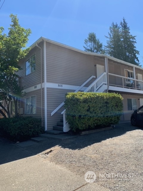 808 Main Street Sultan, WA 98294 - Photo 3 of 13 a backyard of a house with lots of green space
