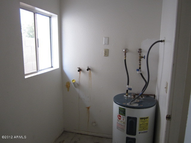 4315 East Vineyard Road Phoenix, AZ 85042 - Photo 25 of 25 Inside laundryroom