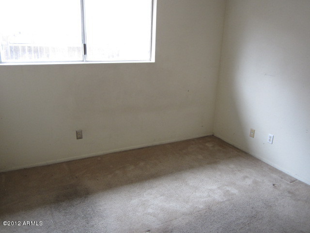 4315 East Vineyard Road Phoenix, AZ 85042 - Photo 7 of 25 023-247410 - Bedroom 3