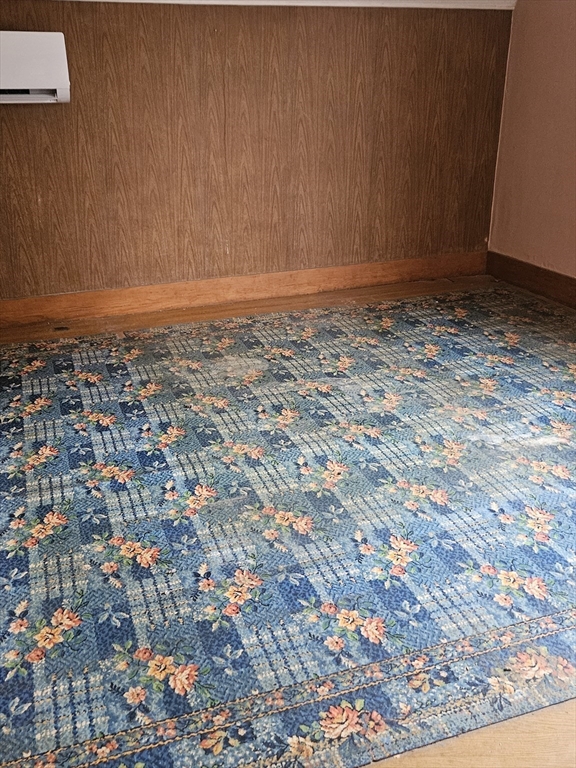 49 Sparks Street Lowell, MA 01854 - Photo 15 of 27 a view of a room with wooden floor