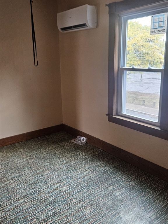 49 Sparks Street Lowell, MA 01854 - Photo 17 of 27 a view of a room with window