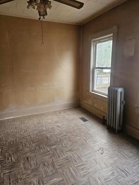 49 Sparks Street Lowell, MA 01854 - Photo 22 of 27 a view of an empty room with a window