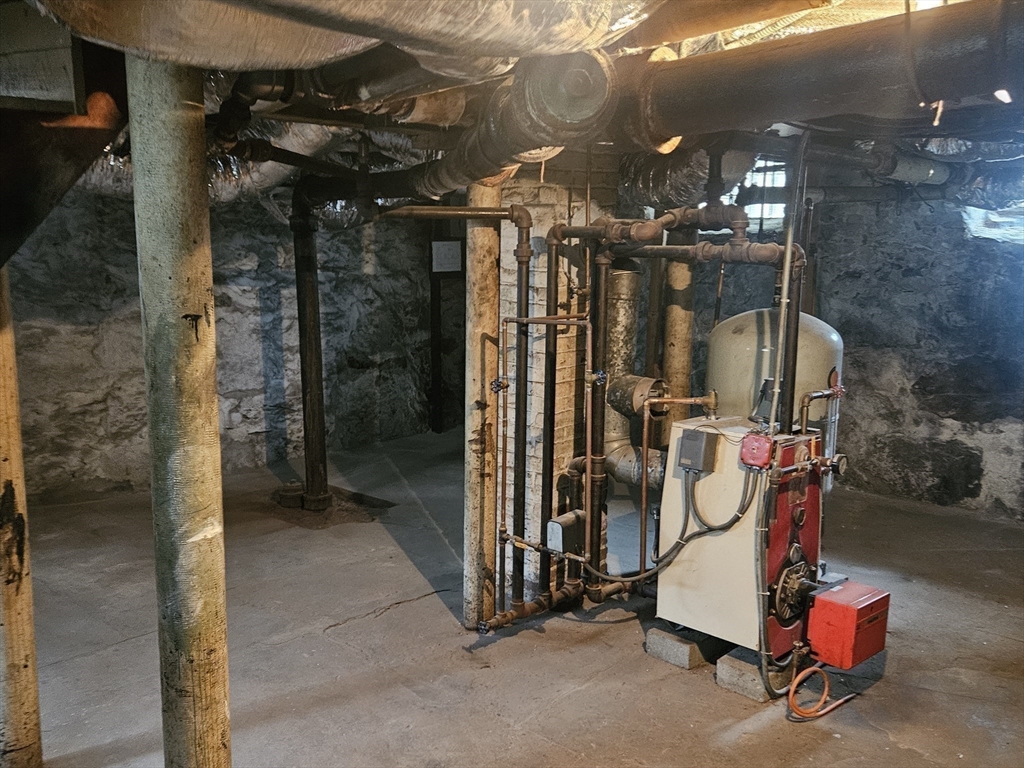 49 Sparks Street Lowell, MA 01854 - Photo 27 of 27 a view of a room with gym equipment