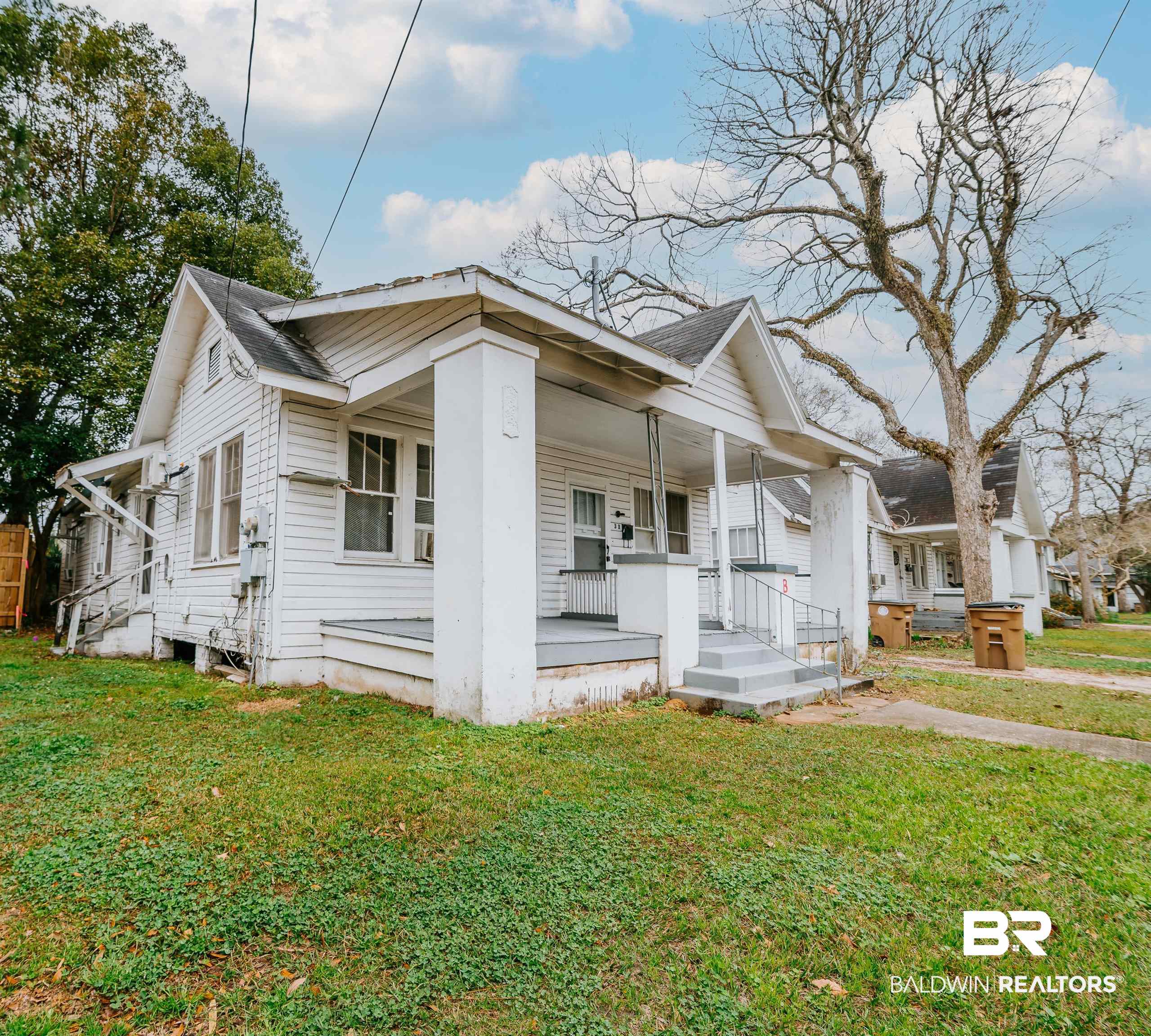 5 North Fulton Street Mobile, AL 36607 - Photo 27 of 55 View of front of property with covered porch and a front yard