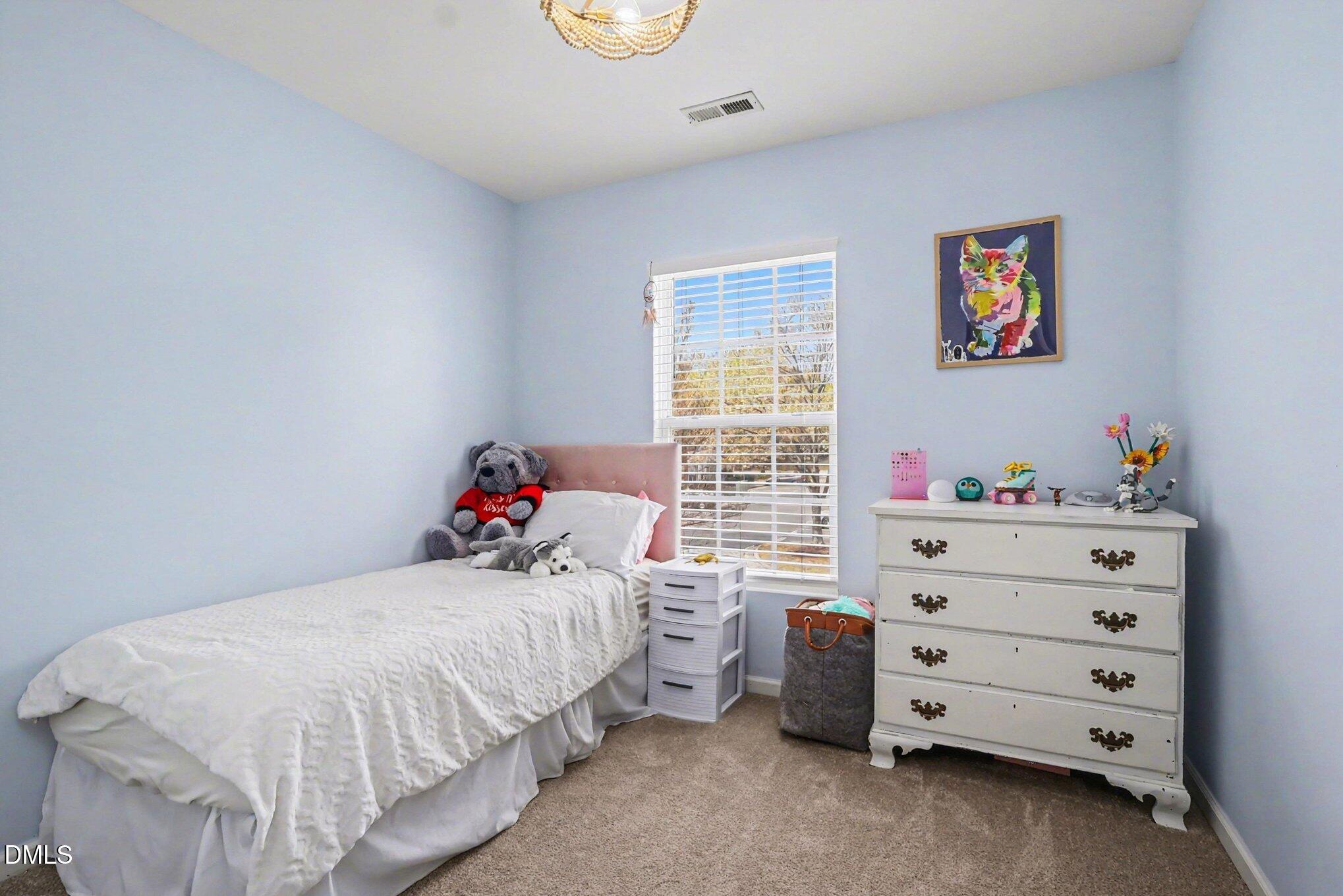 8211 Rhiannon Road Raleigh, NC 27613 - Photo 17 of 25 Bedroom 3