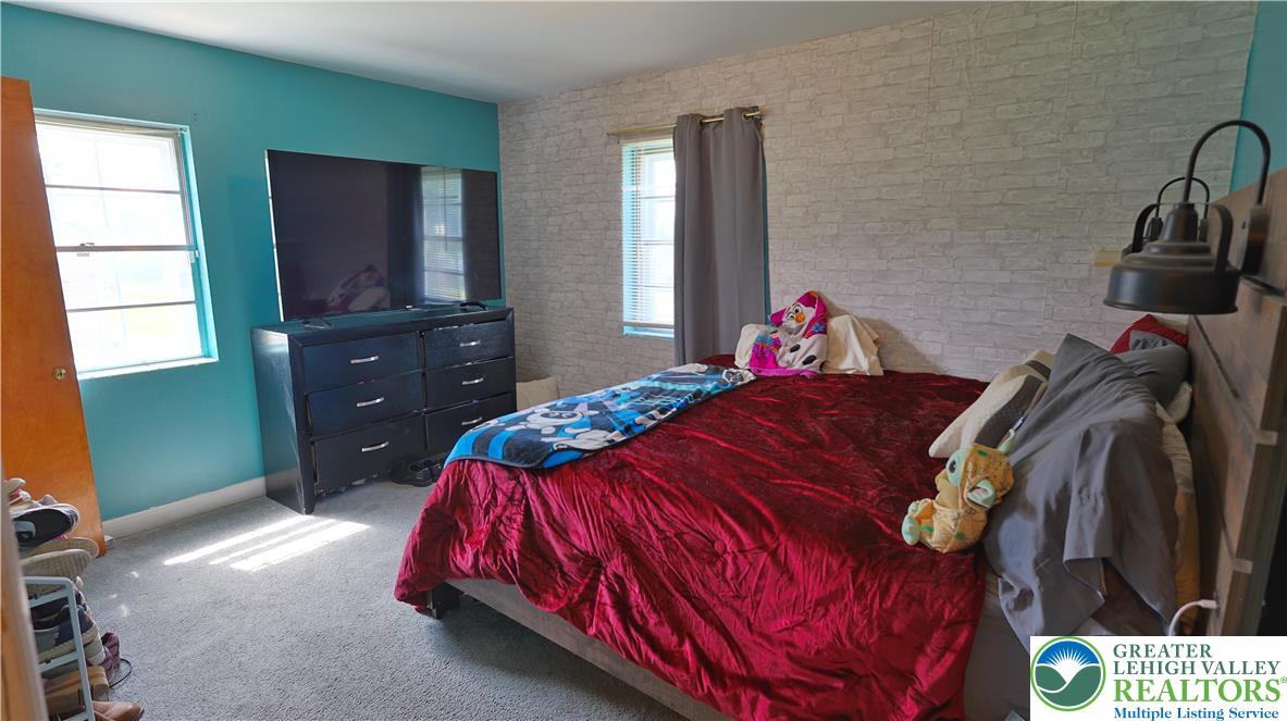 1345 Macada Road Bethlehem, PA 18017 - Photo 6 of 23 a bedroom with a bed and a dresser
