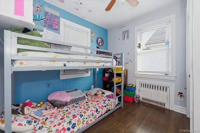 a bed room with a bed and a window