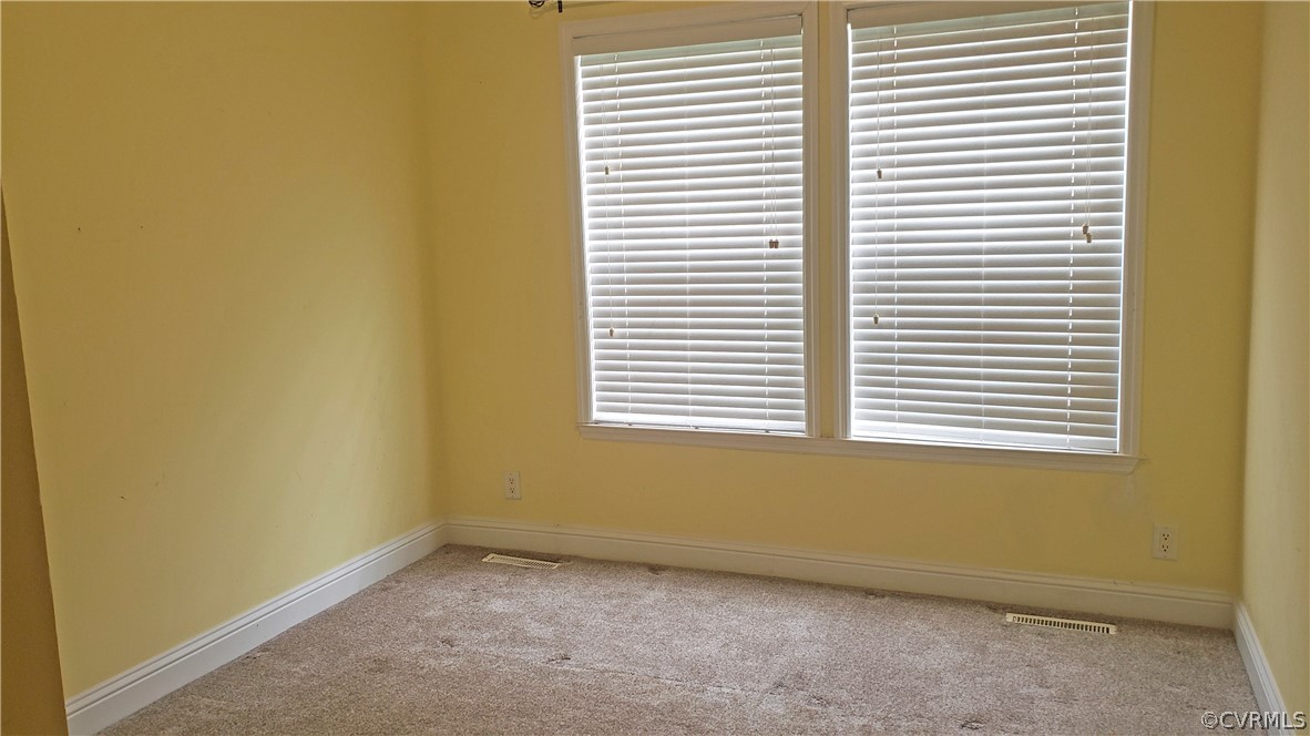 169 Old Sheppards Road Farmville, VA 23901 - Photo 12 of 17 an empty room with a window