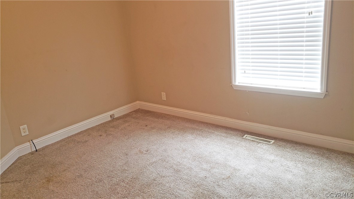 169 Old Sheppards Road Farmville, VA 23901 - Photo 14 of 17 an empty room with a window