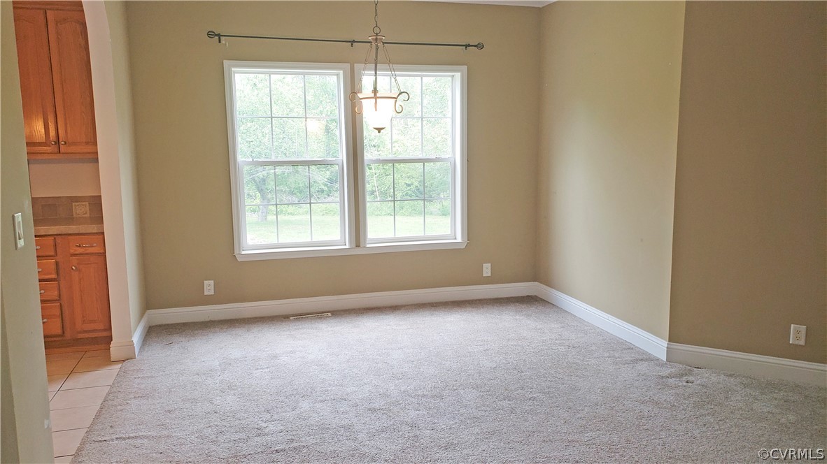 169 Old Sheppards Road Farmville, VA 23901 - Photo 5 of 17 an empty room with a window