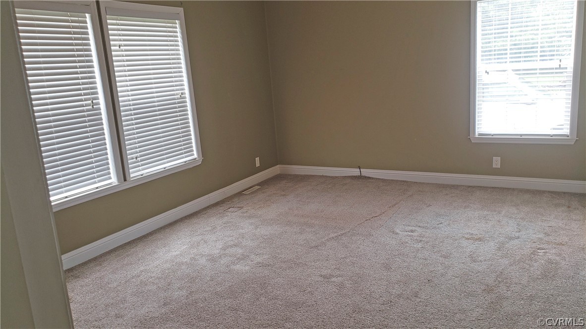 169 Old Sheppards Road Farmville, VA 23901 - Photo 8 of 17 an empty room with a window