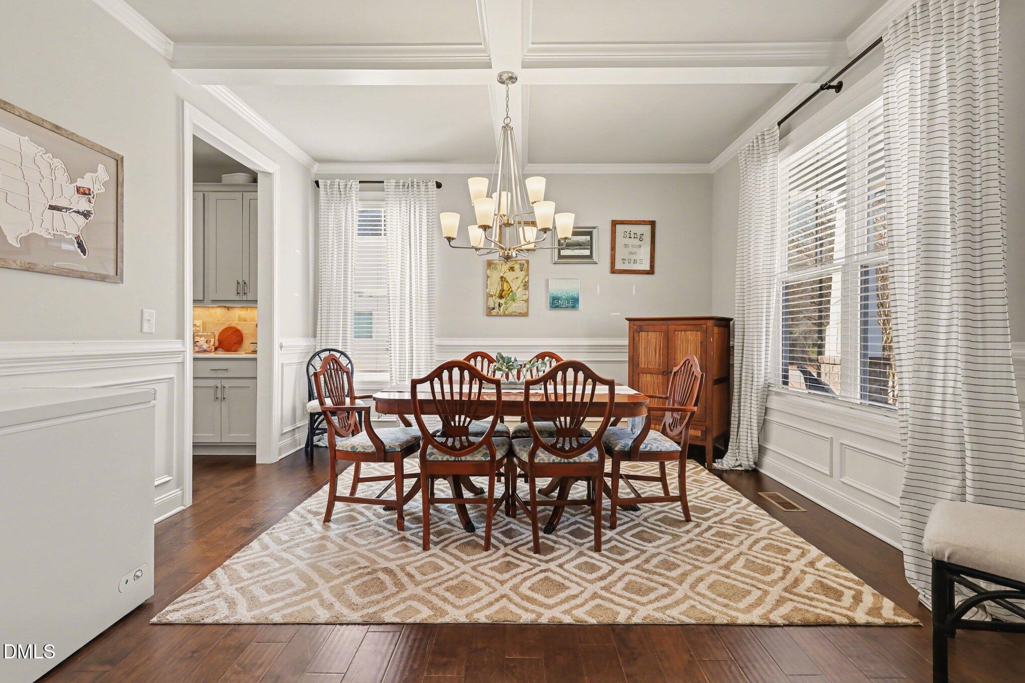 274 Colson Ridge Drive Clayton, NC 27520 - Photo 16 of 48 a view of a dining room with furniture window and wooden floor