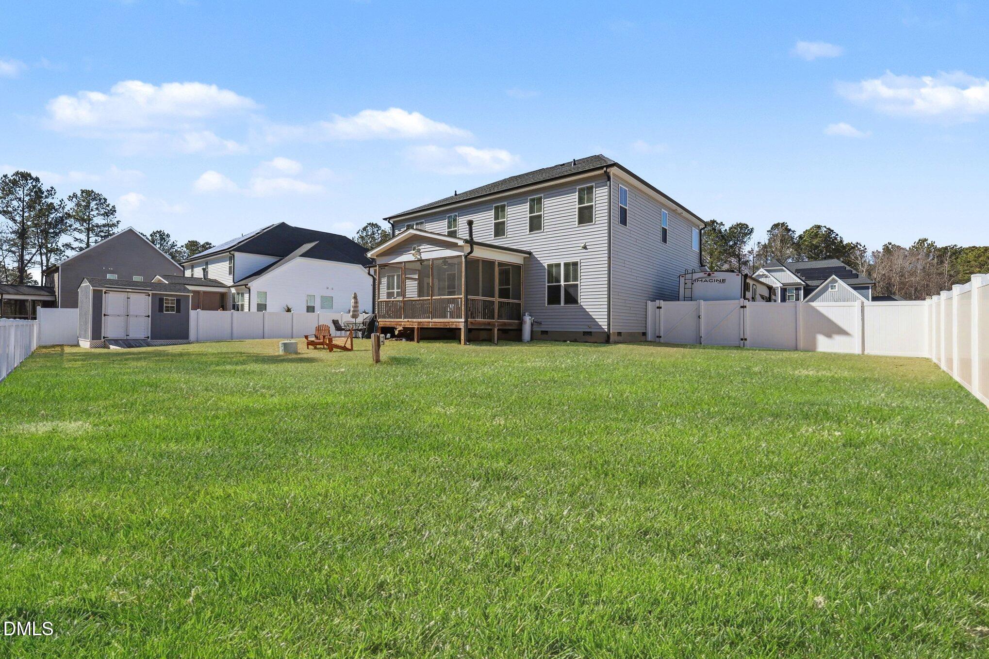 274 Colson Ridge Drive Clayton, NC 27520 - Photo 3 of 48 a view of a house with a yard and sitting area