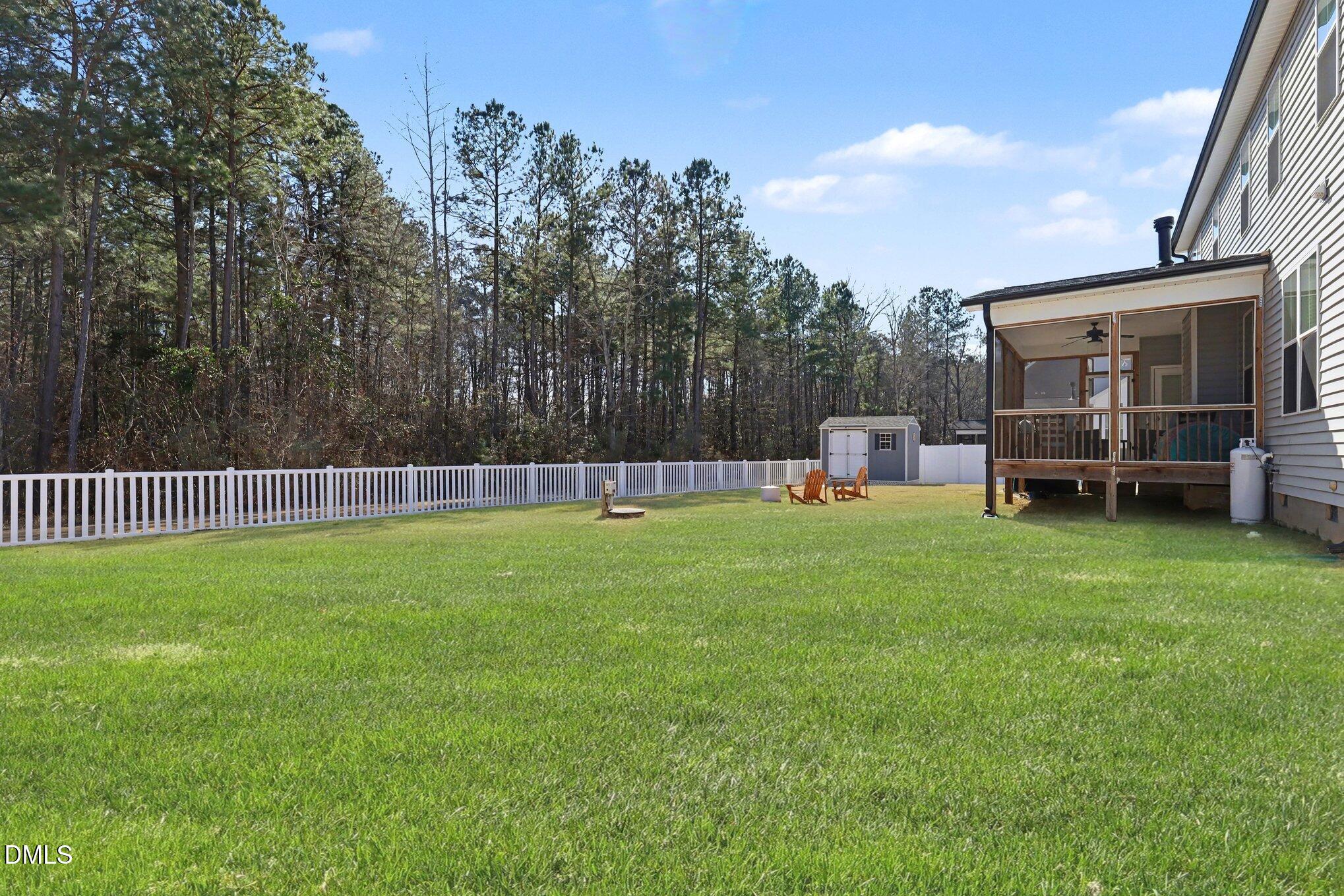 274 Colson Ridge Drive Clayton, NC 27520 - Photo 4 of 48 a house view with a garden space