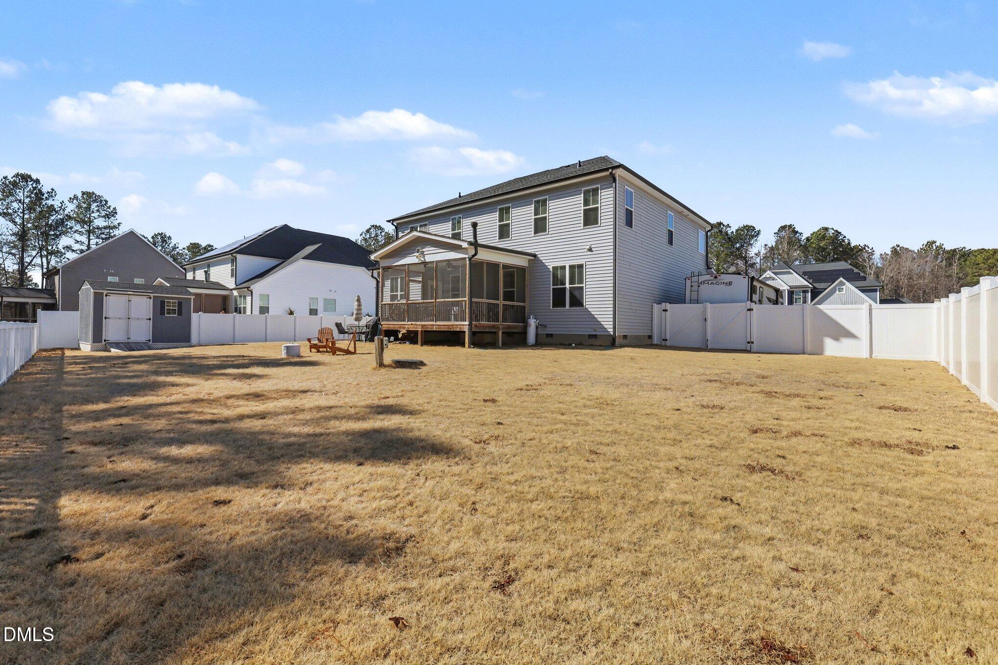 274 Colson Ridge Drive Clayton, NC 27520 - Photo 43 of 48 a view of a house with a yard