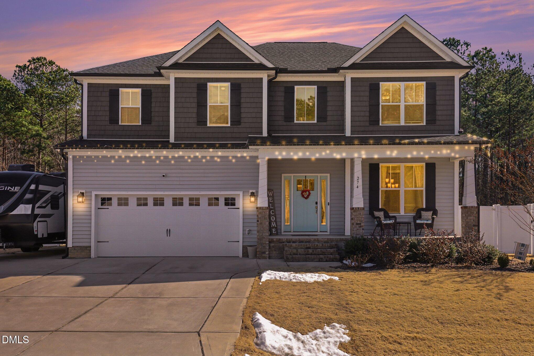 274 Colson Ridge Drive Clayton, NC 27520 - Photo 7 of 48 a front view of a house