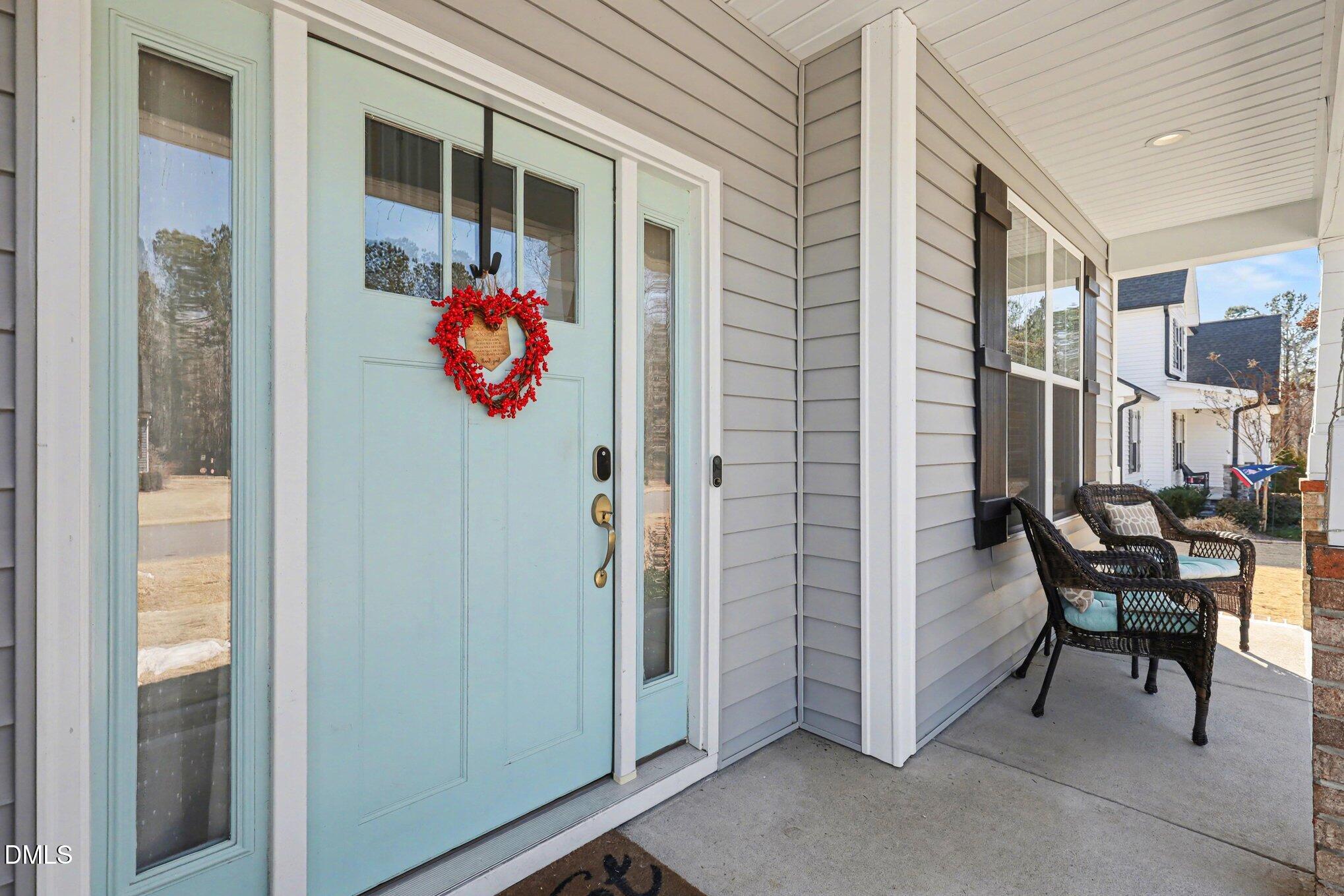 274 Colson Ridge Drive Clayton, NC 27520 - Photo 8 of 48 a front view of a house with outdoor seating