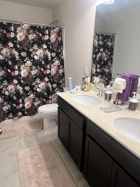 1905 Azure Grove Court Marietta, GA 30008 - Photo 11 of 29 a bathroom with a sink toilet and mirror