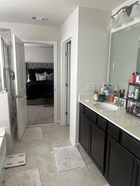 1905 Azure Grove Court Marietta, GA 30008 - Photo 18 of 29 a en suite bathroom with a double vanity sink and a mirror