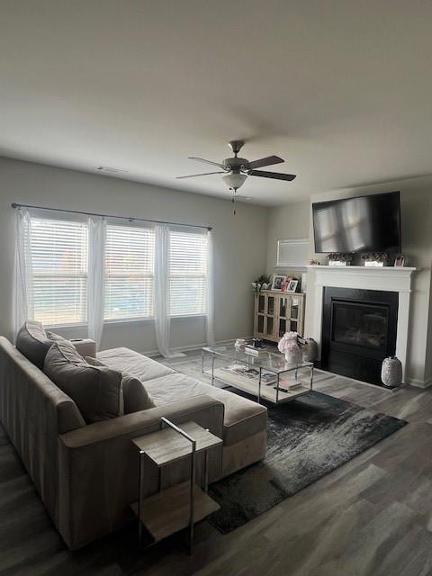 1905 Azure Grove Court Marietta, GA 30008 - Photo 3 of 29 a living room with furniture a fireplace and a flat screen tv