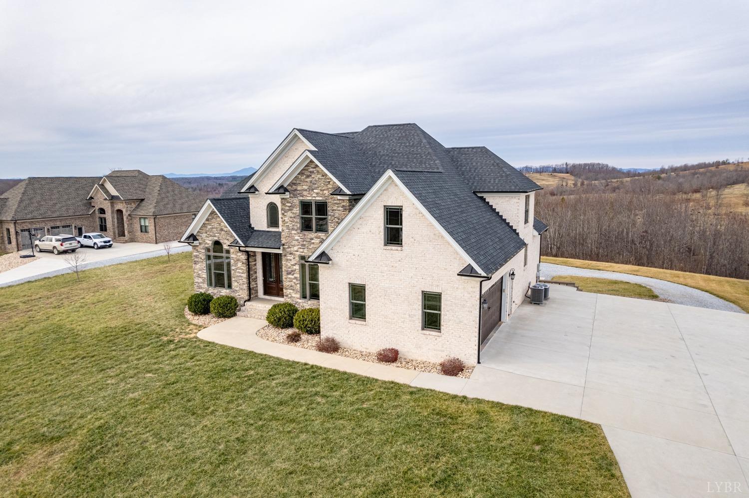 967 Lynbrook Road Rustburg, VA 24588 - Photo 13 of 99 a view of a house with a big yard and large trees