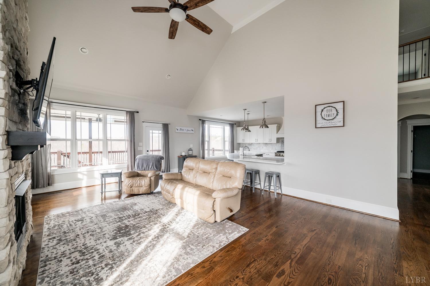 967 Lynbrook Road Rustburg, VA 24588 - Photo 36 of 99 a living room with furniture and a wooden floor