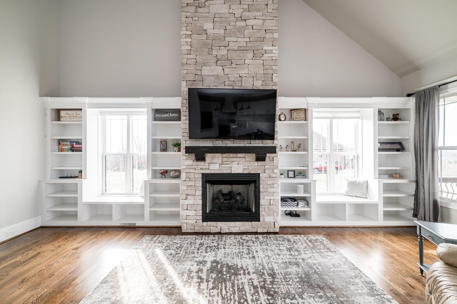 967 Lynbrook Road Rustburg, VA 24588 - Photo 38 of 99 a living room with a fireplace a flat screen tv and a fireplace