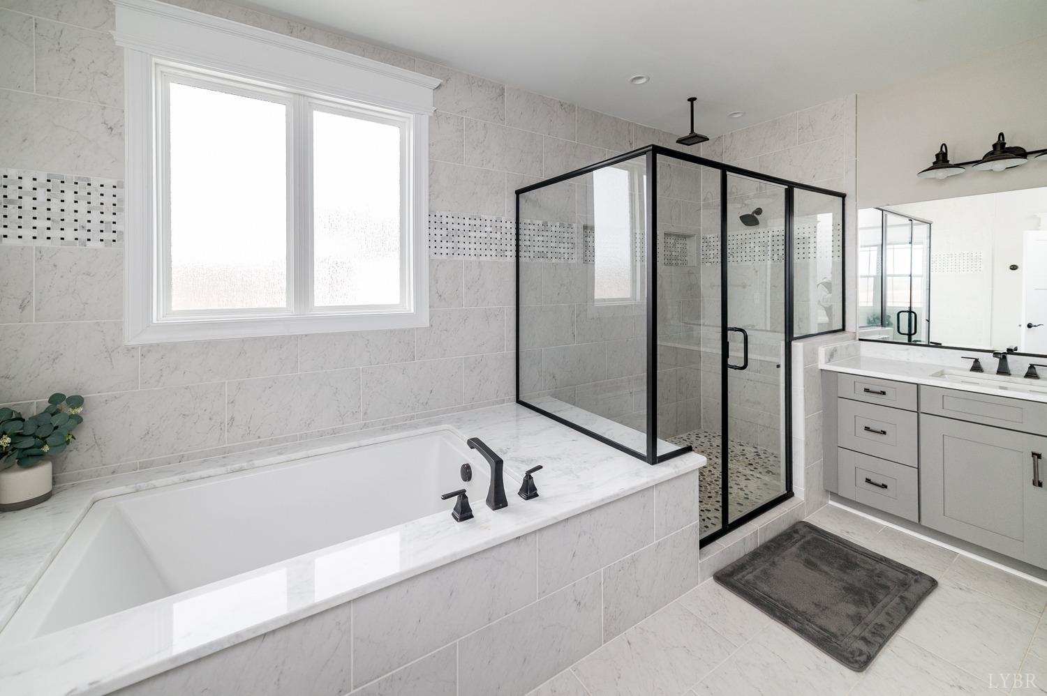 967 Lynbrook Road Rustburg, VA 24588 - Photo 56 of 99 a bathroom with a bathtub and a shower