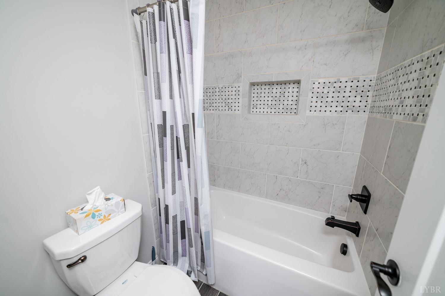 967 Lynbrook Road Rustburg, VA 24588 - Photo 63 of 99 a white bath tub sitting next to a white toilet