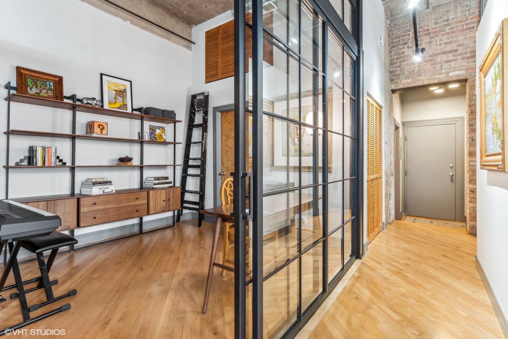 215 North Aberdeen Street, Unit 405A Chicago, IL 60607 - Photo 10 of 20 a view of a bedroom with furniture and window