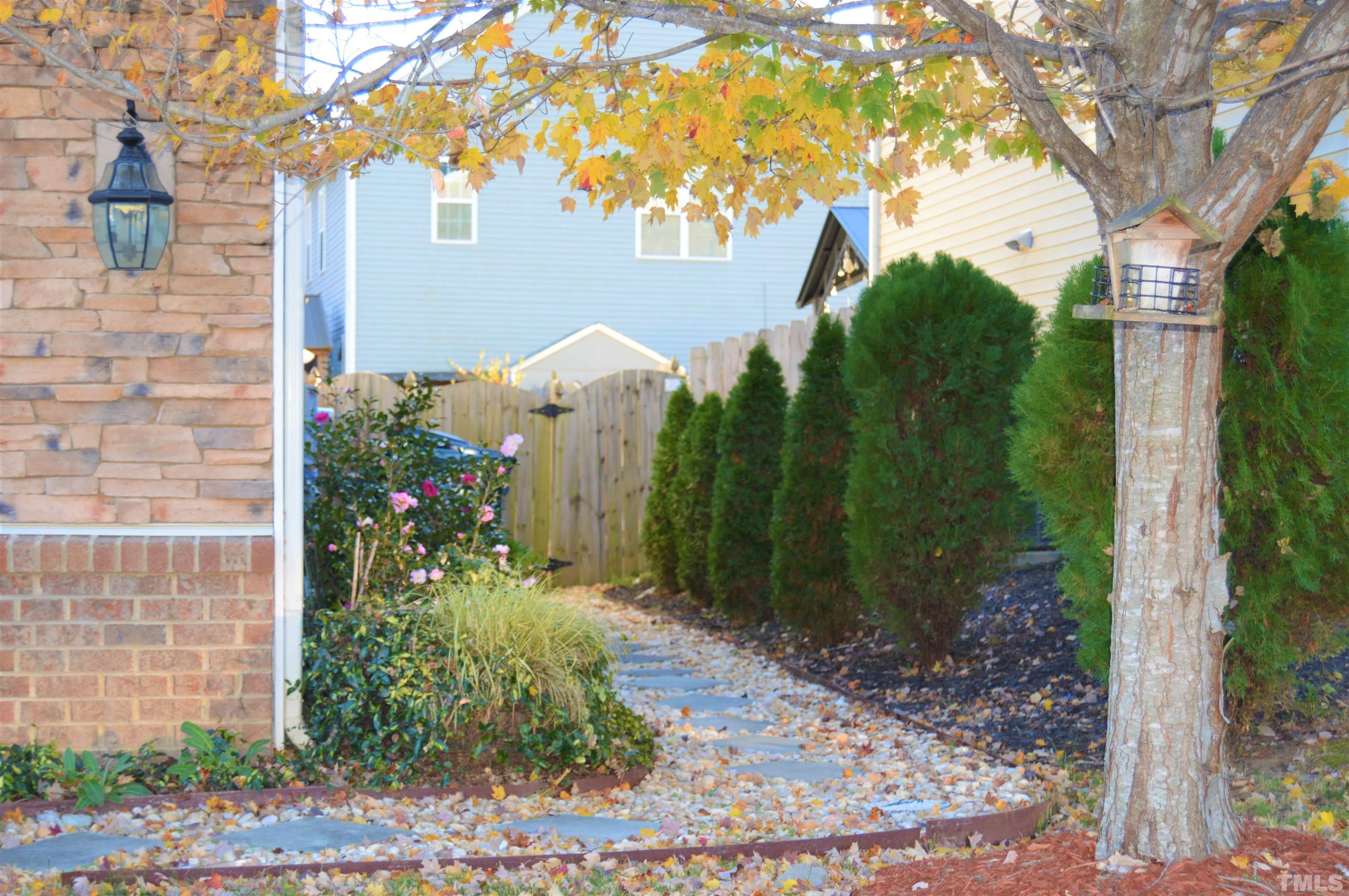 1308 Lombar Street Raleigh, NC 27610 - Photo 2 of 26 a view of a garden