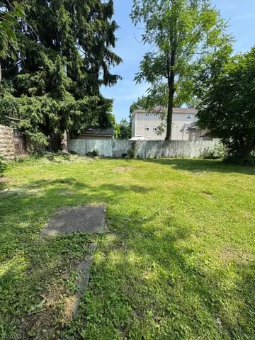 a fire hydrant in the middle of a field